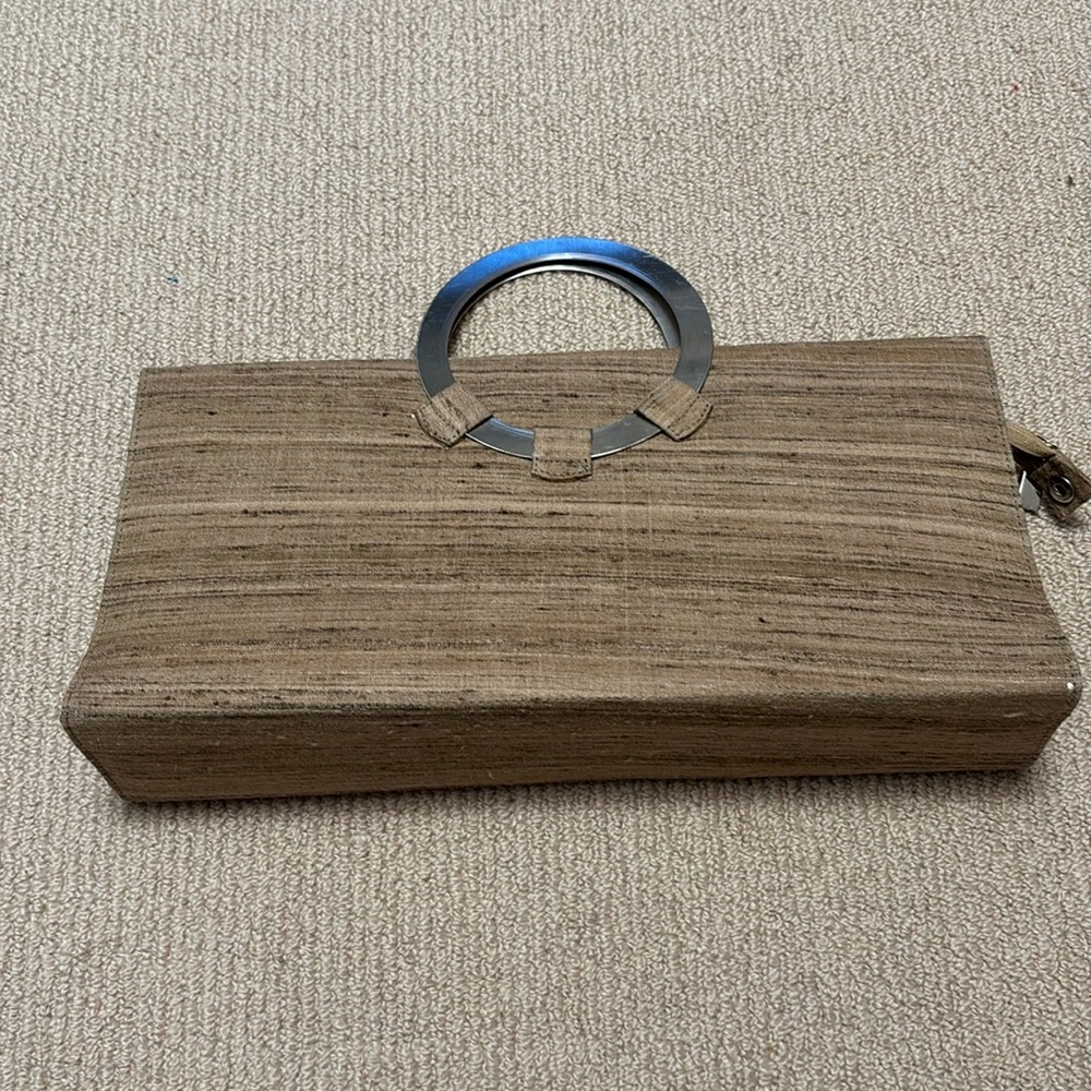 Raw silk purse with metal handles